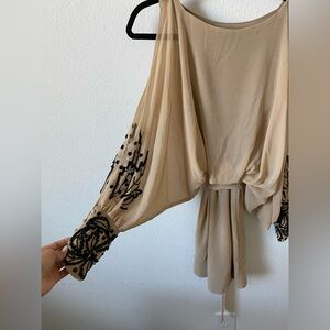 RARE VINTAGE Beige dress with black sequin embroidery.